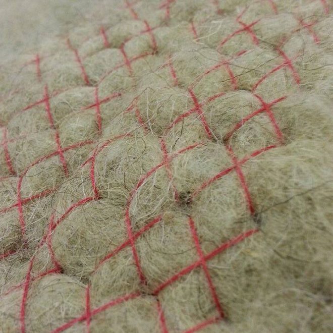 Aya Kirresh, the skirt,2015, wool insulator made in Biella -Palestinian cross-stitch embroidery, courtesy of the artist